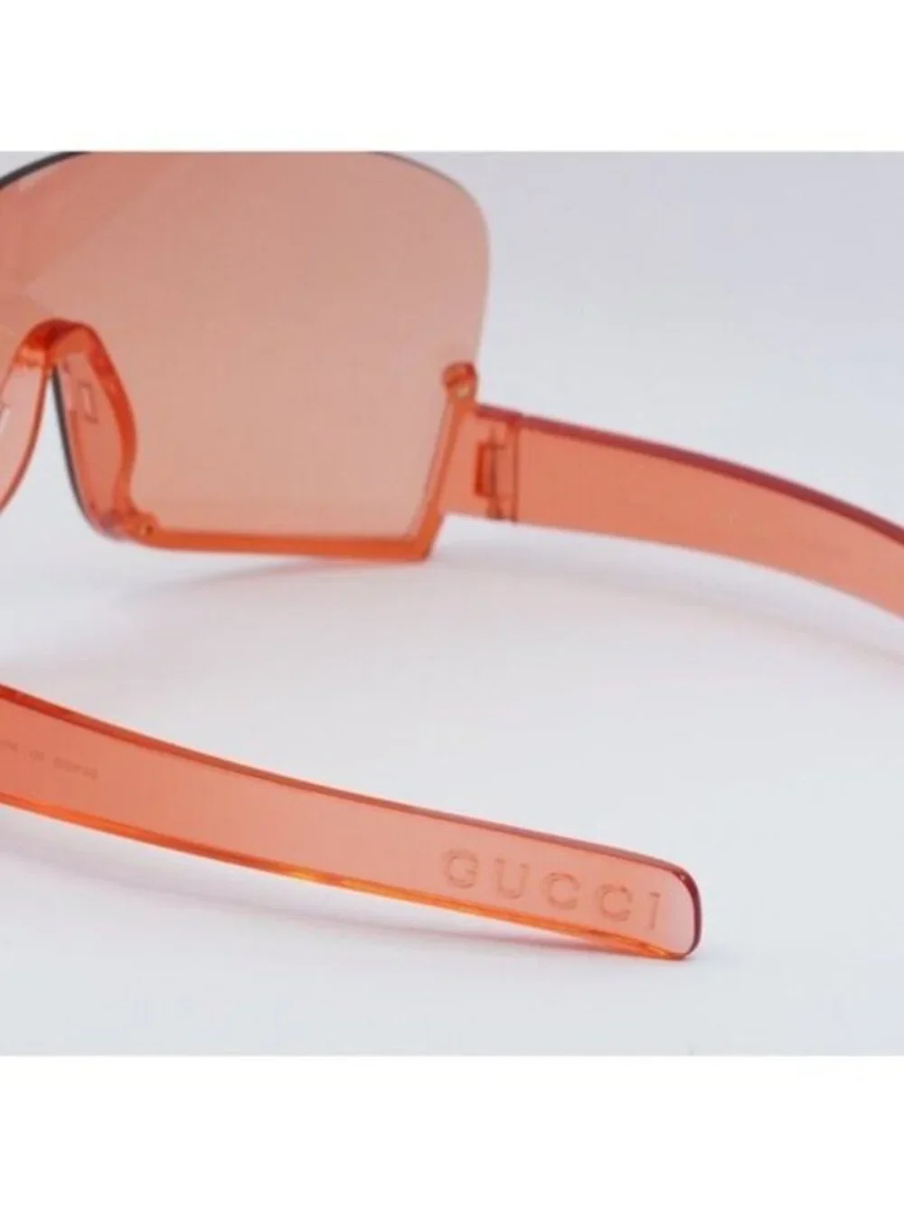 Gucci GG1631S 001 Sunglasses Transparent Red Shield Frame, Light Red Lenses